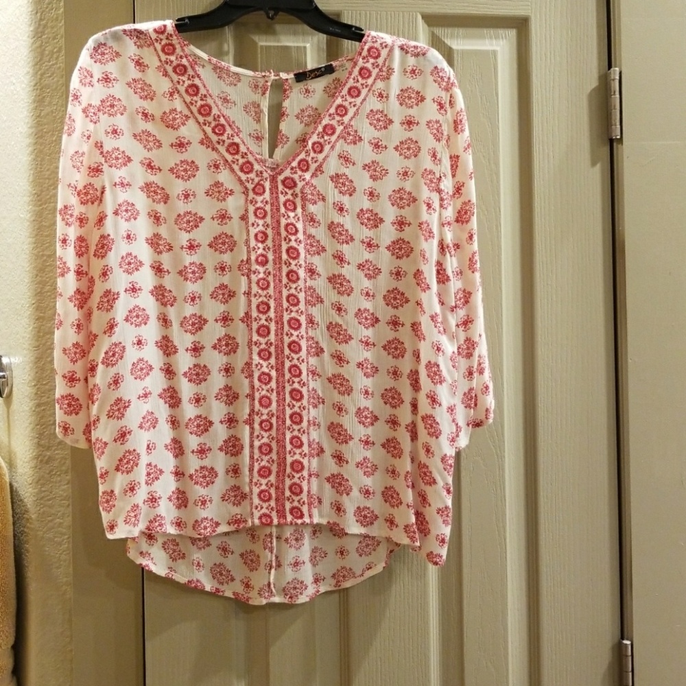 Super cute cream and red 3/4 sleeve with  Longer b